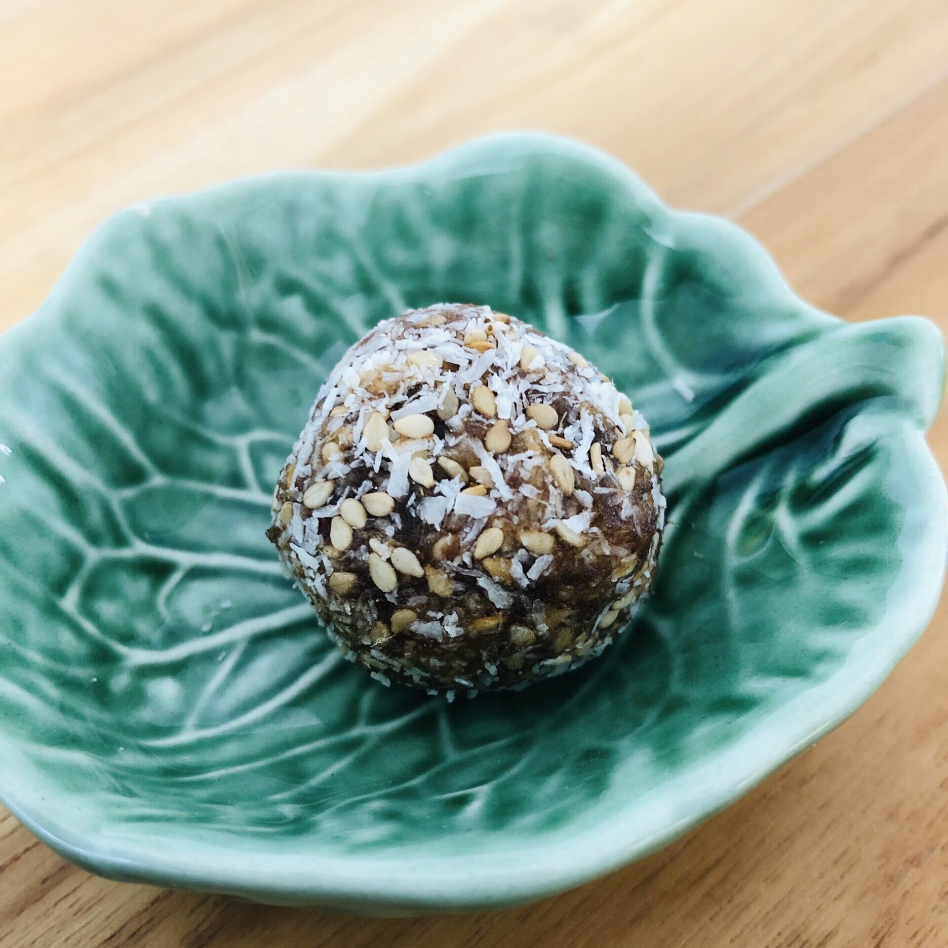 Date balls with coconut and sesame